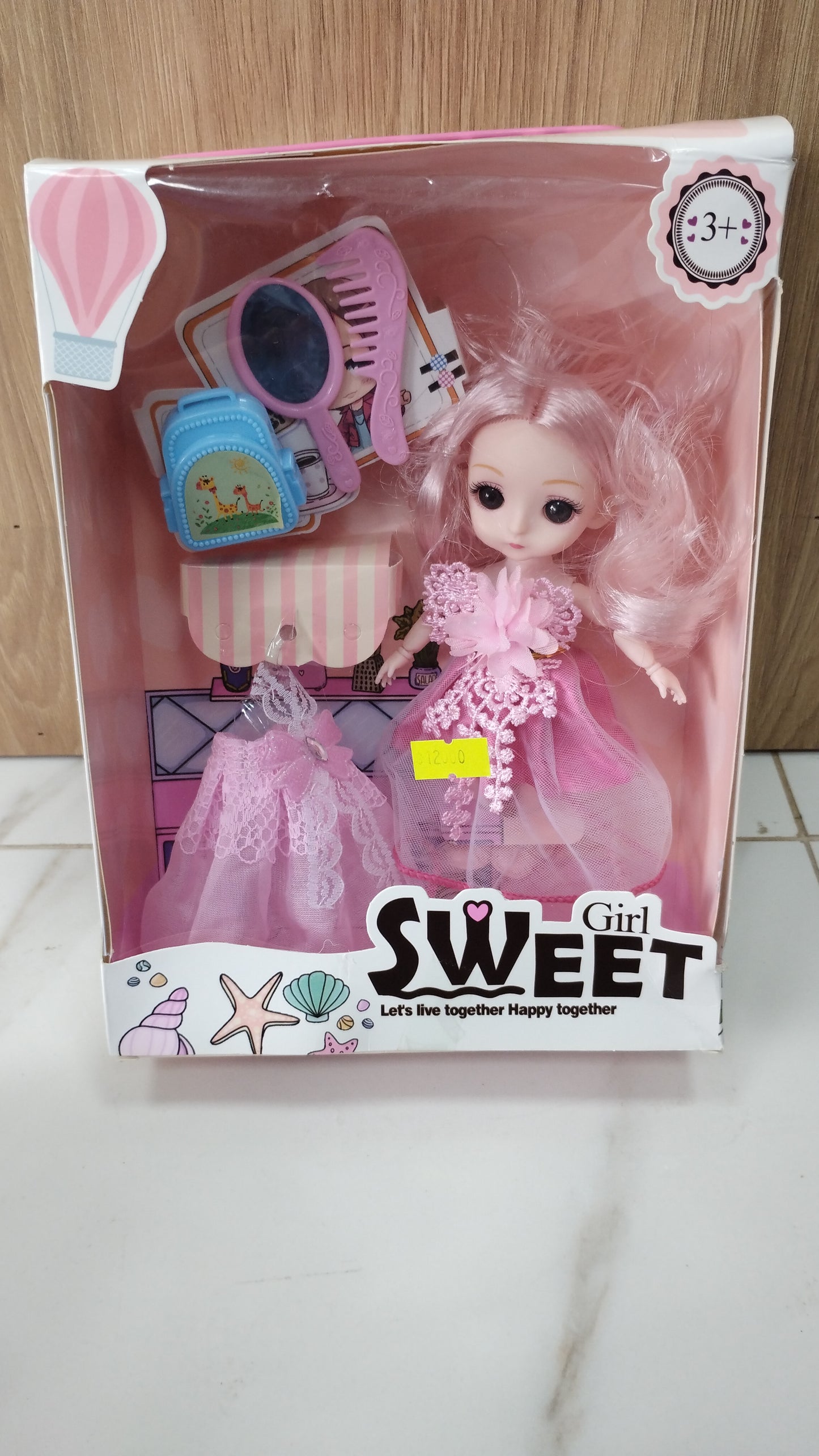 Muñeca con sus accesorios