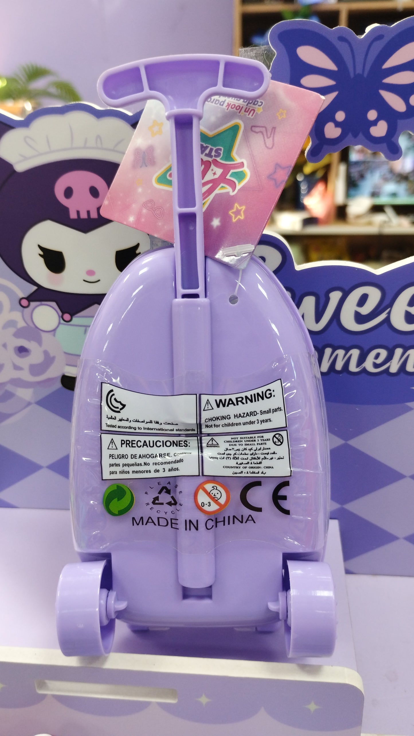 Valija con su muñeca y su ropitas