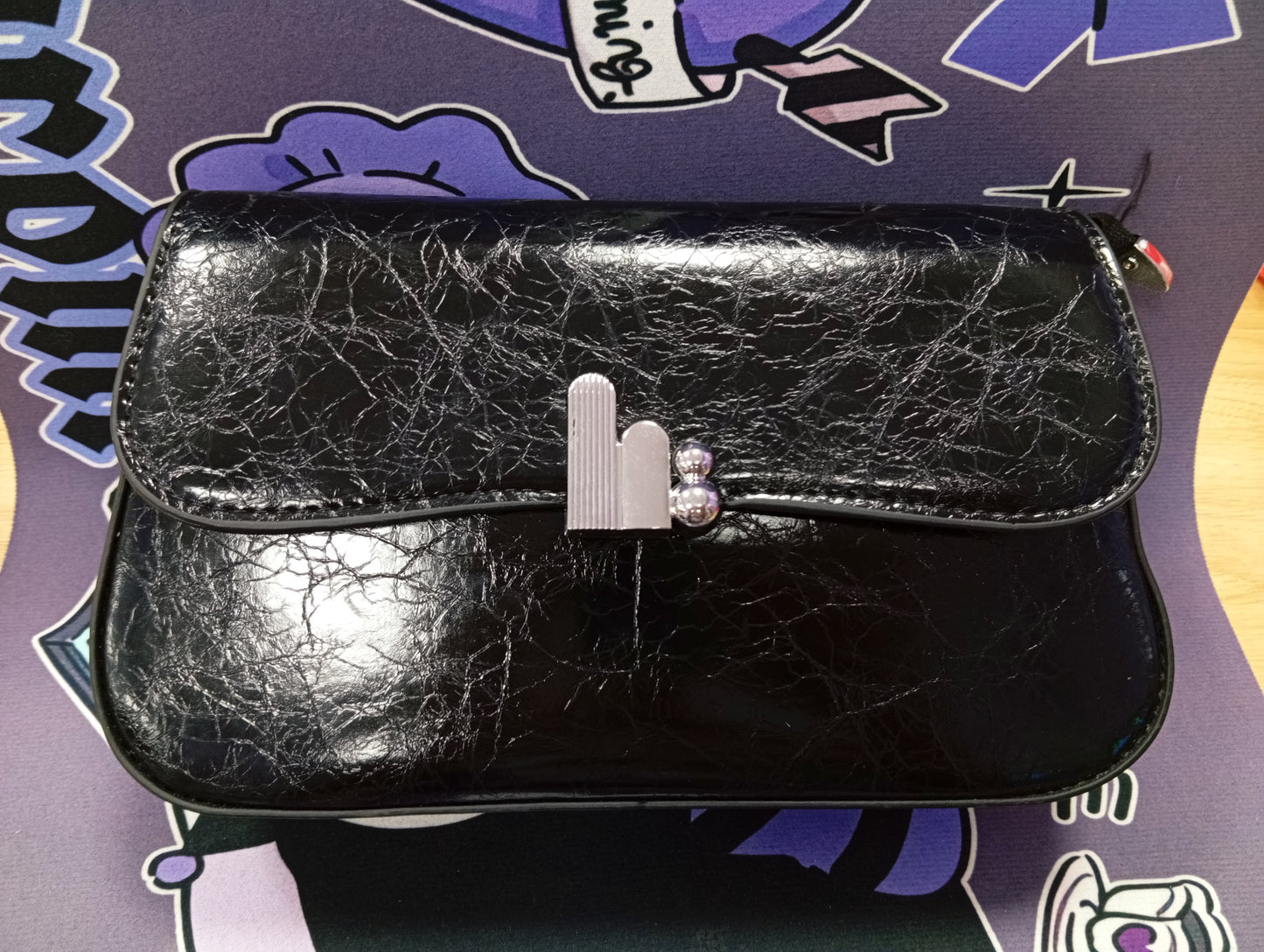 Bolso negro texturizado