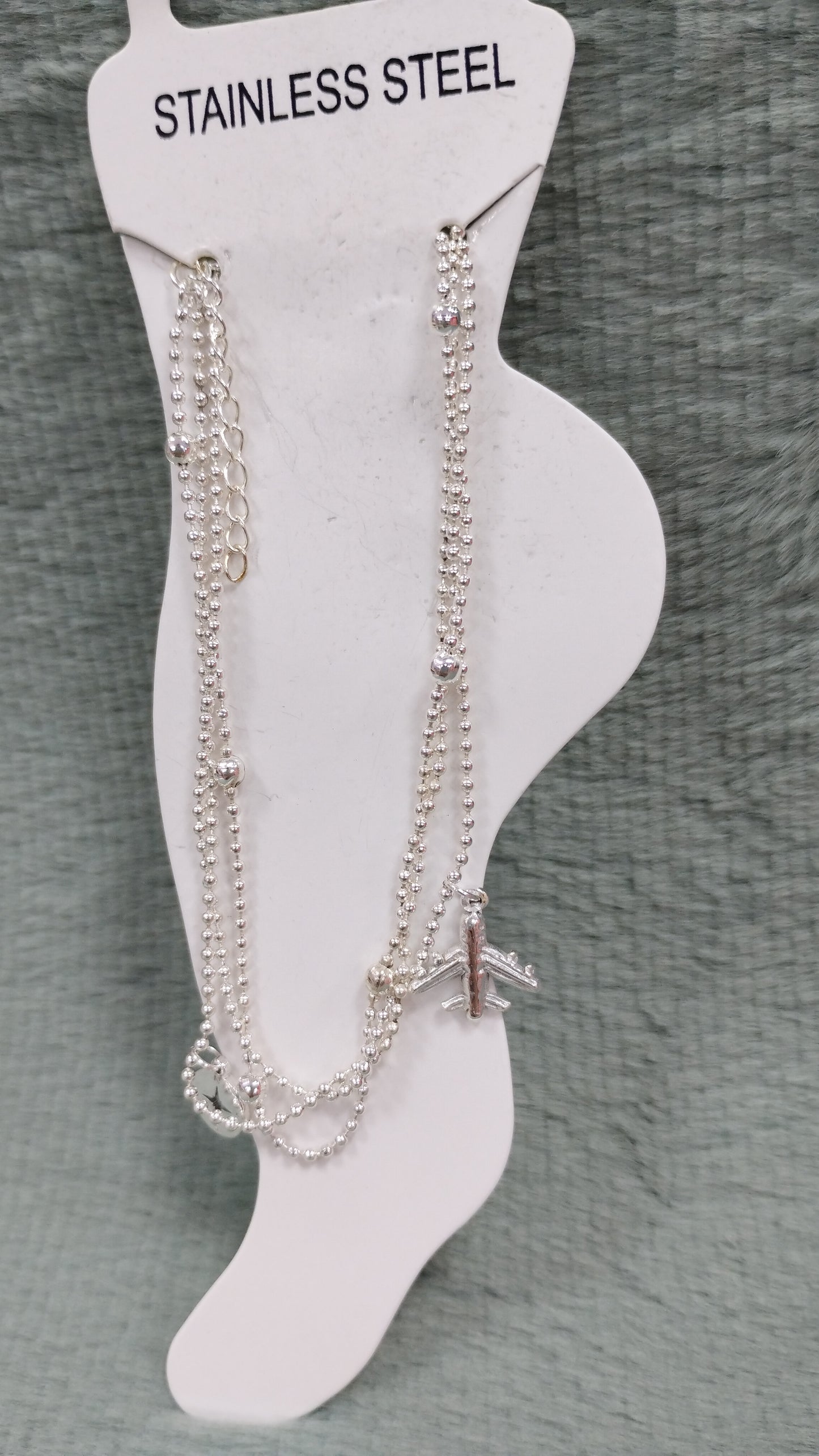 Tobillera de acero blanco