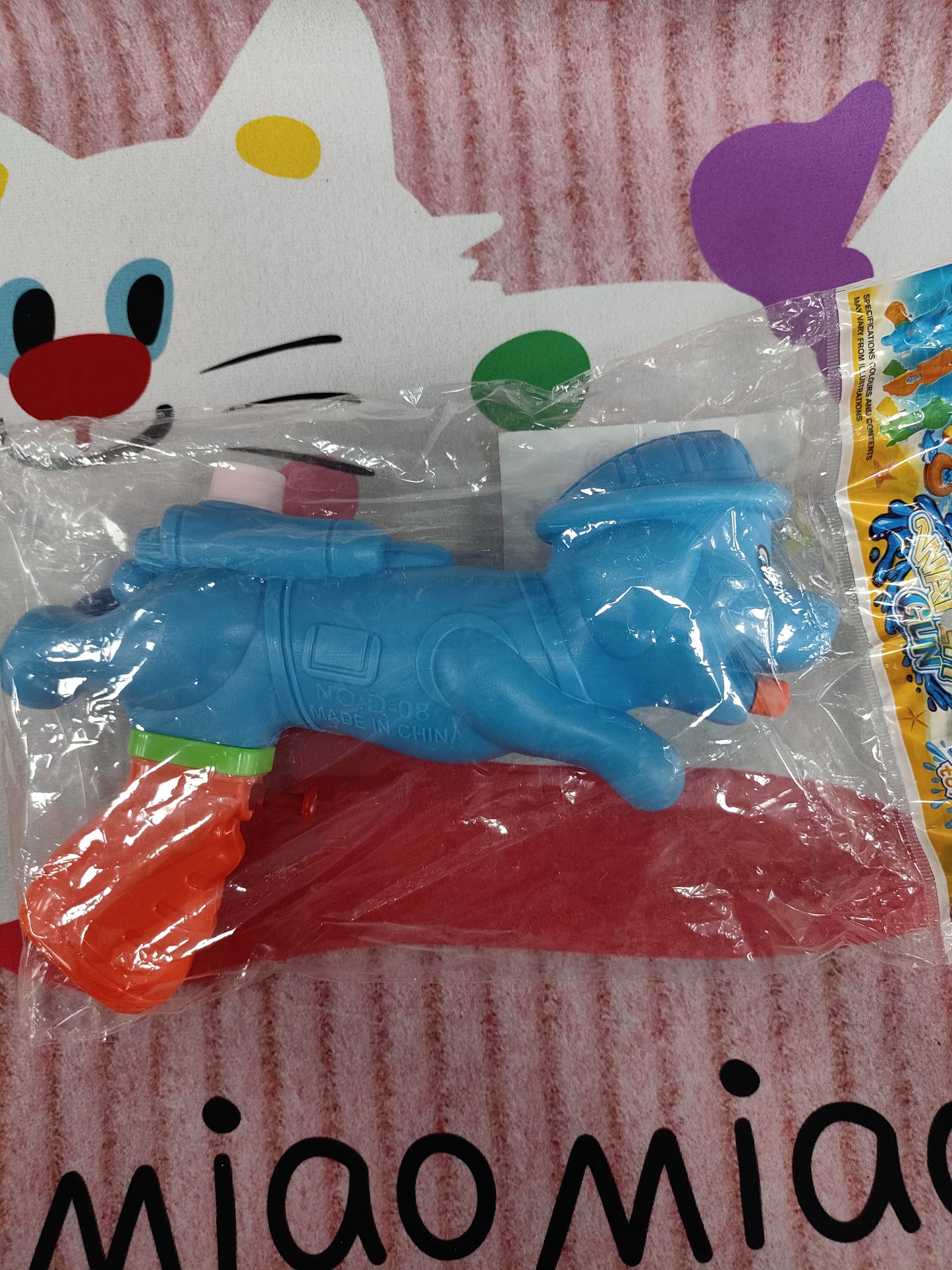 Pistola de agua con forma de perro