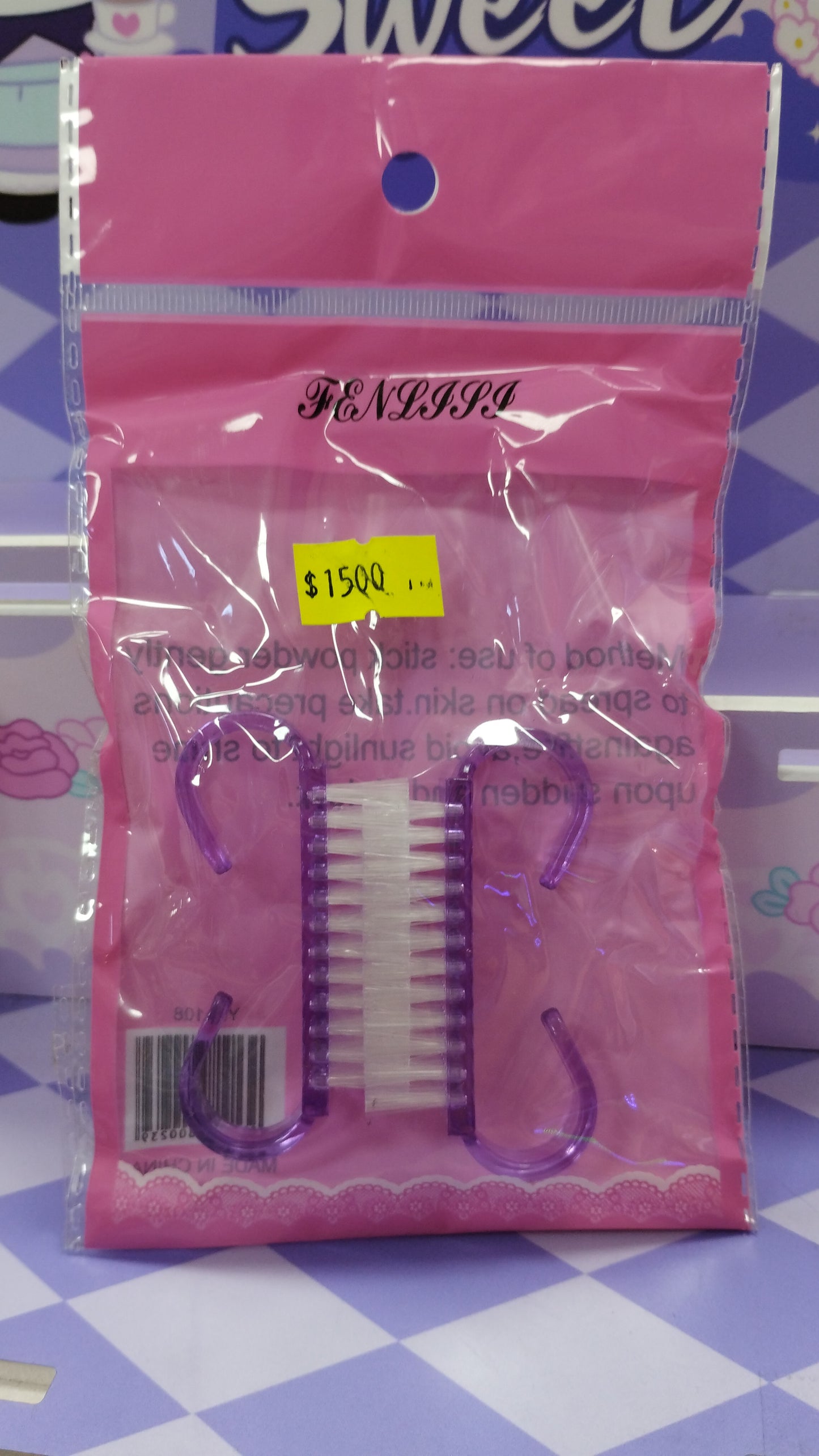 Cepillo para sacar polvo de las uñas