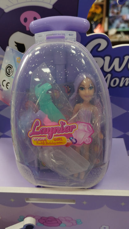 Valija con su muñeca y su ropitas