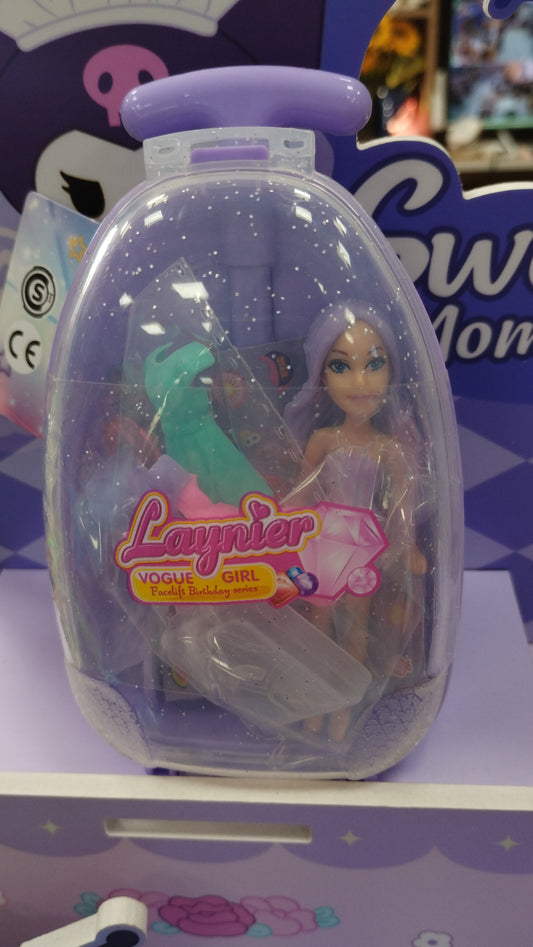 Valija con su muñeca y su ropitas
