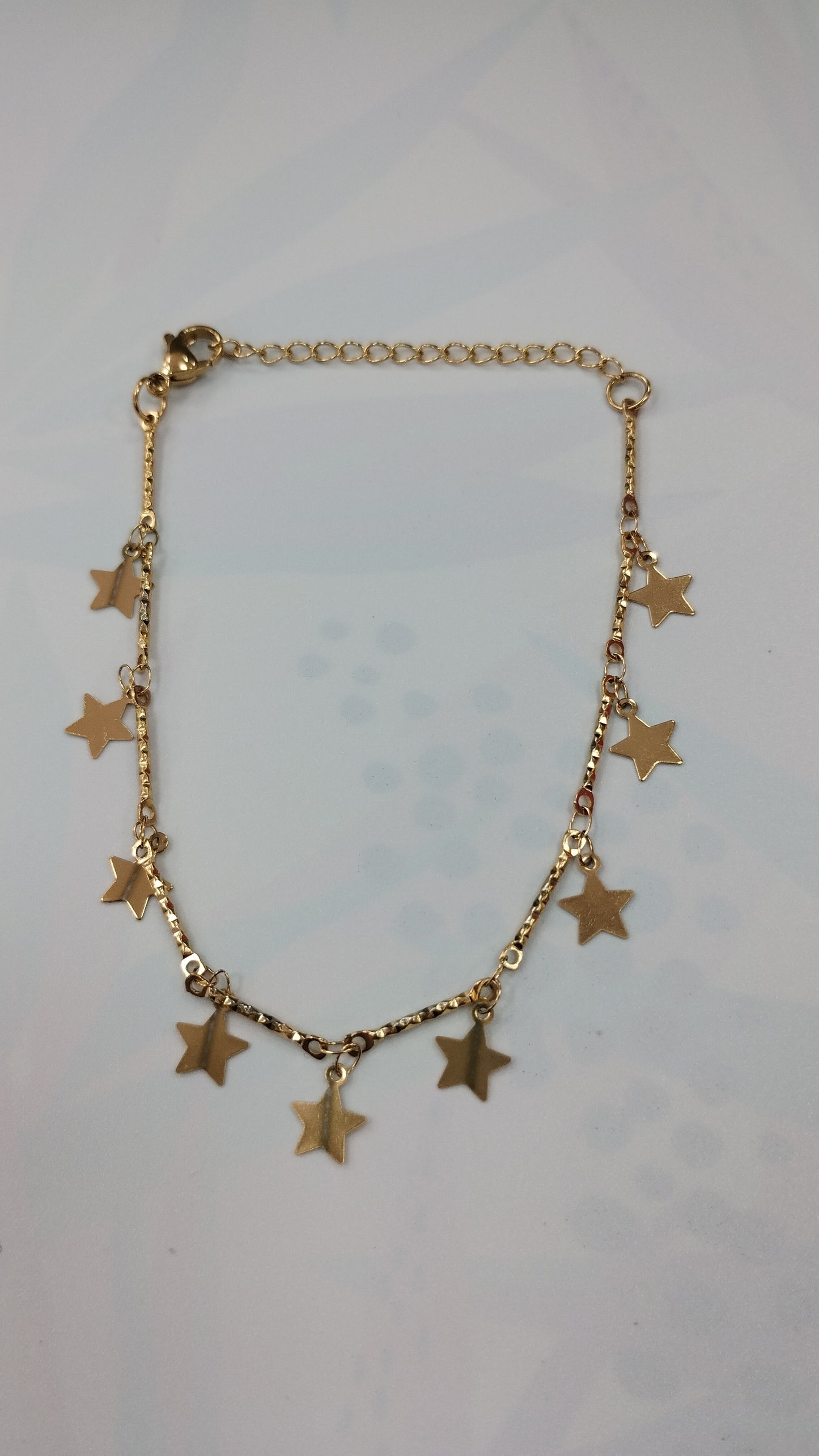 Pulceras de acero blanco y dorado