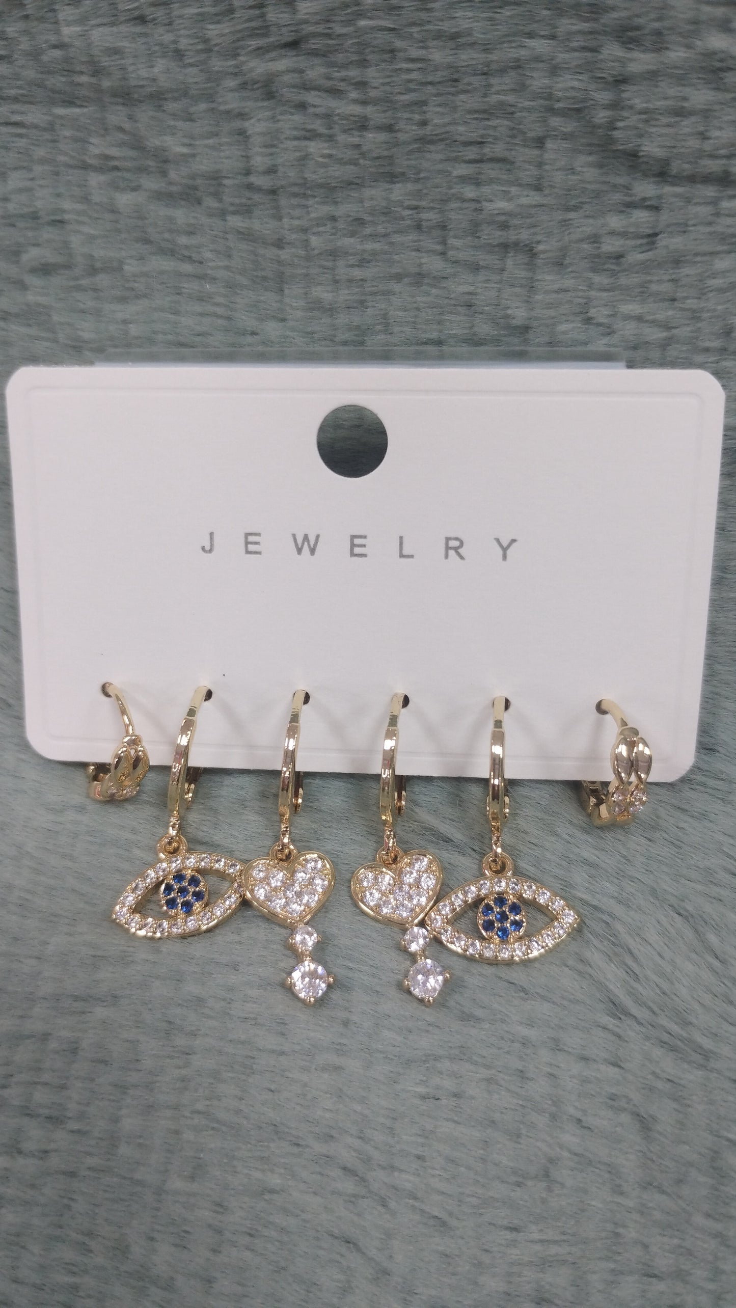 Set de aros de acero blanco y dorado