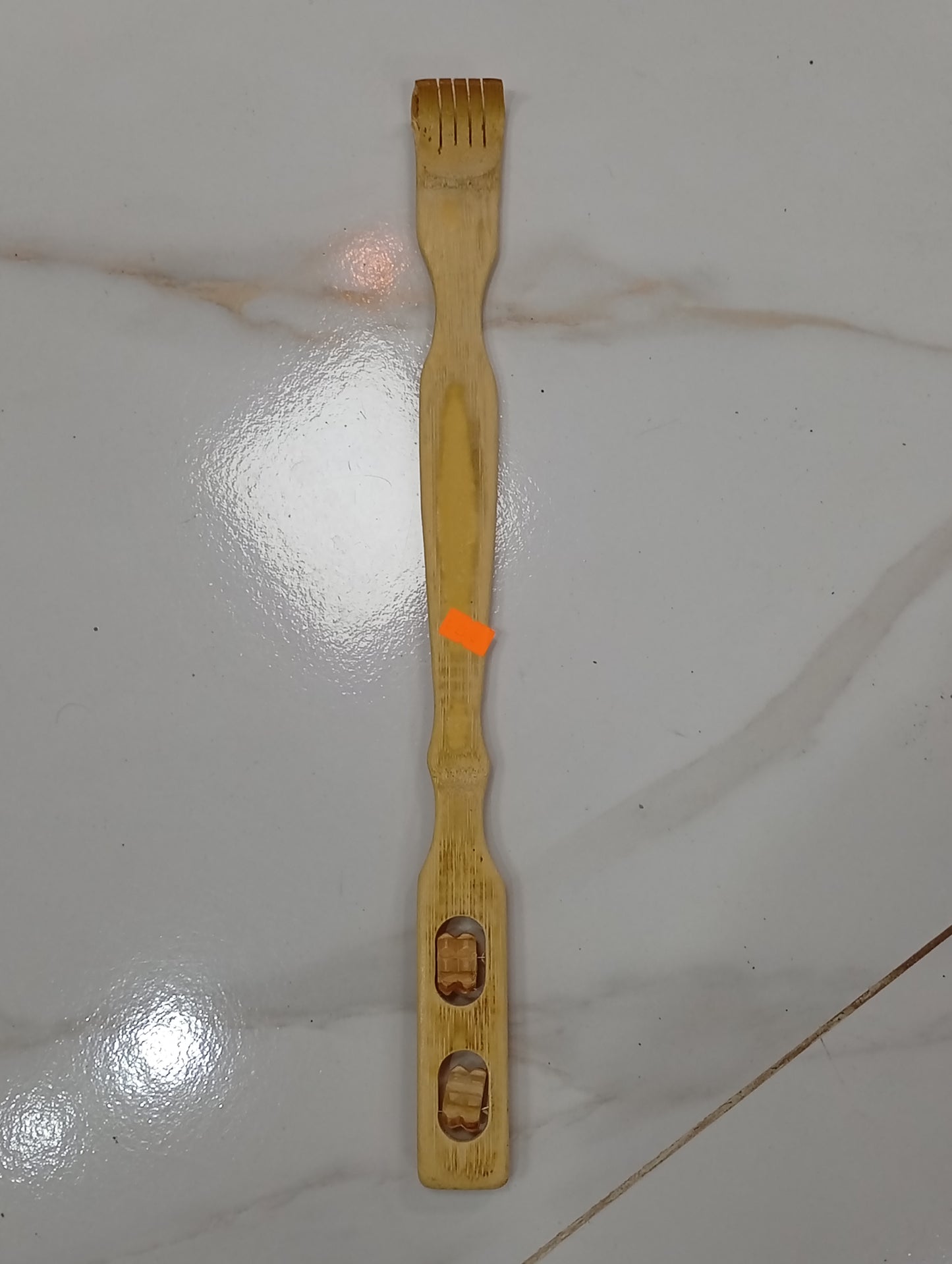 Rascador de espalda