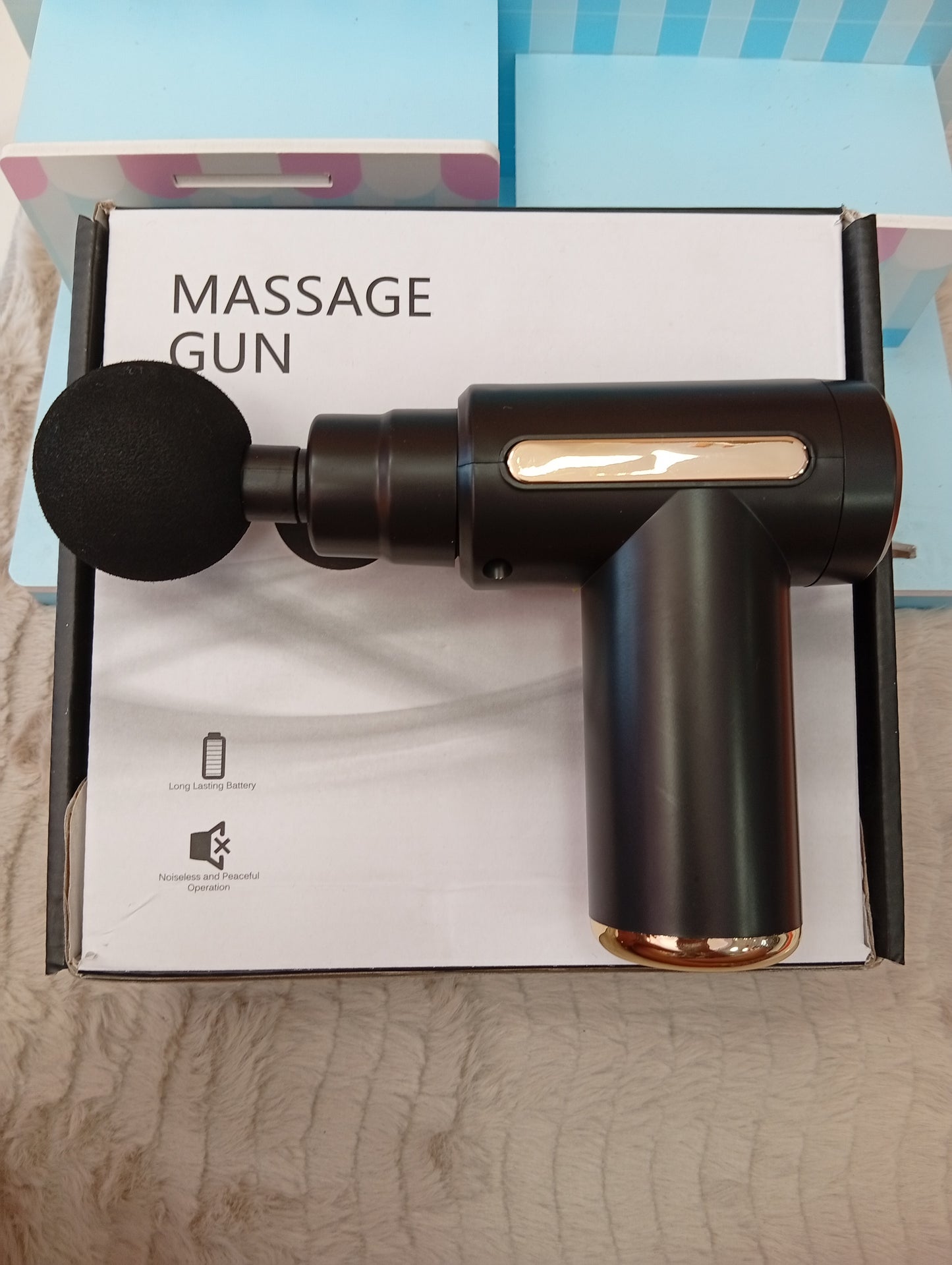 Pistola masajeadora