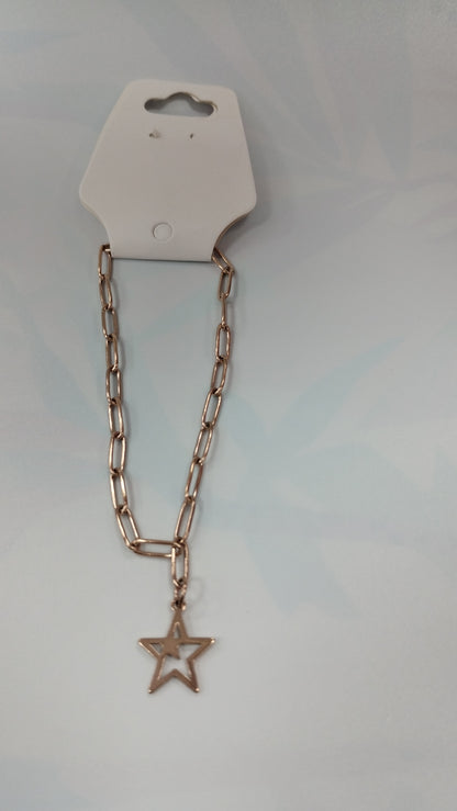 Pulcera de acero blanco y dorado
