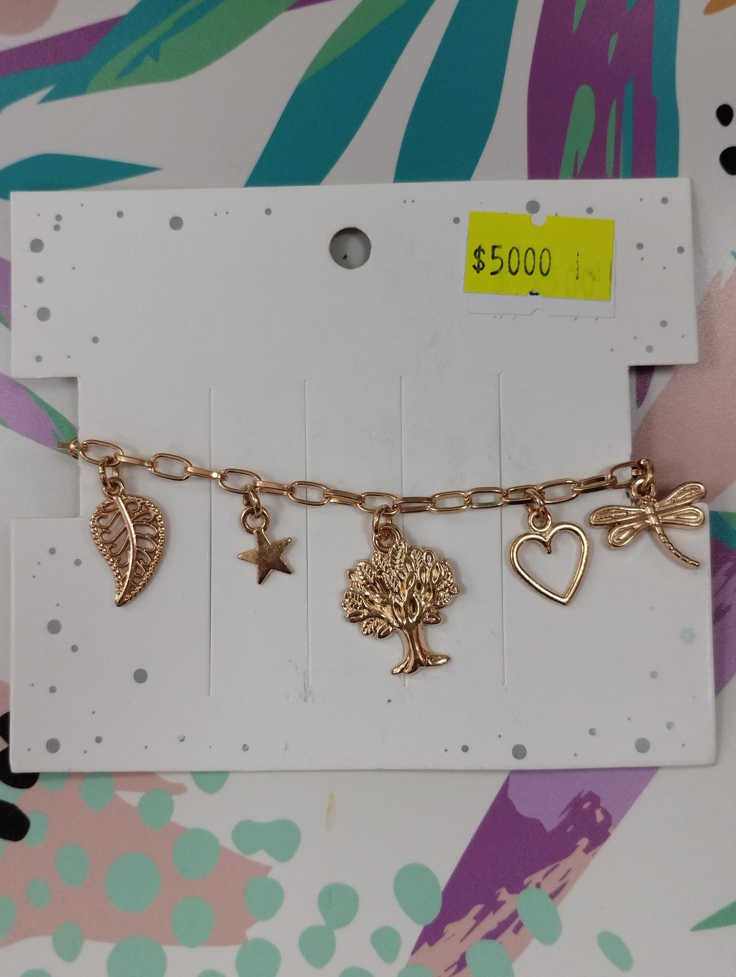 Pulcera de acero blanco y dorado