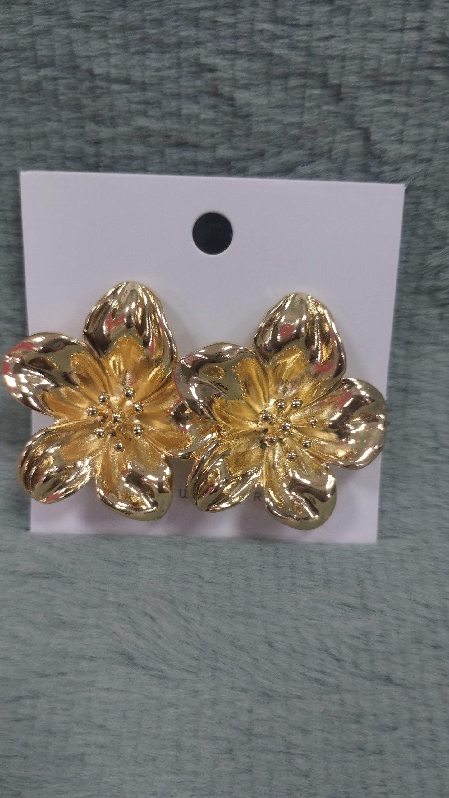 Aros de acero blanco y dorado