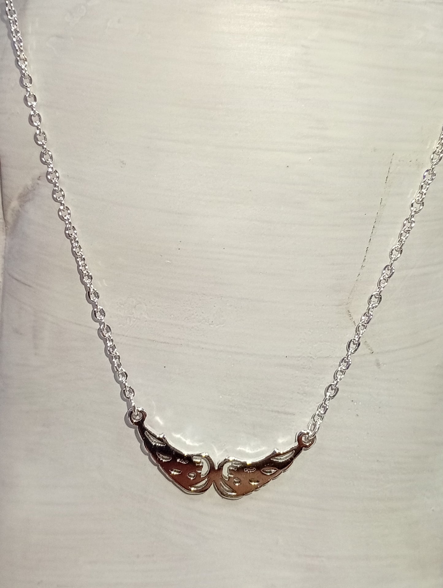 Collar+ dije de alas
