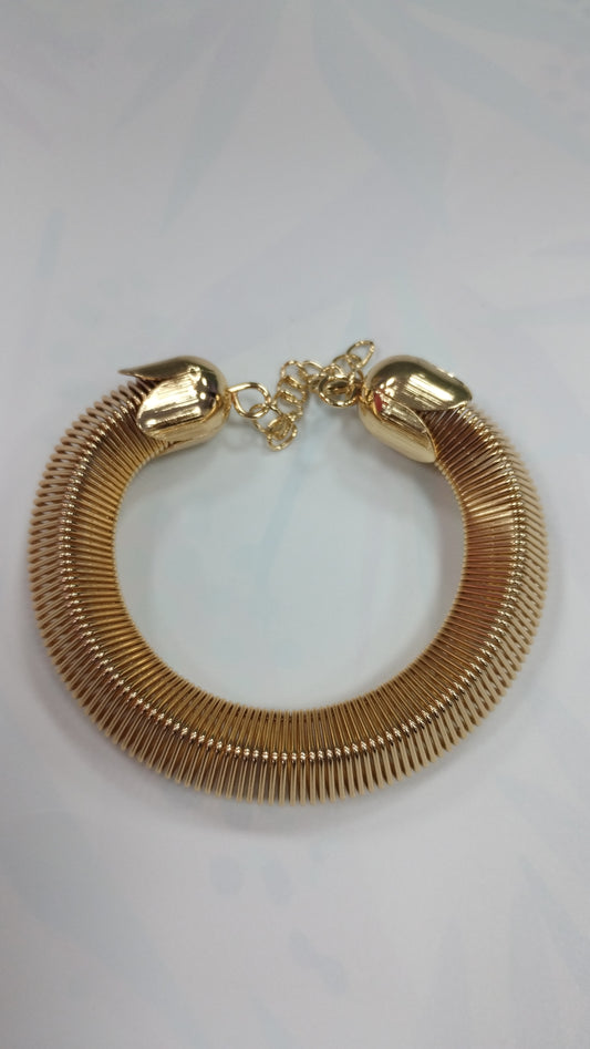 Pulcera de acero blanco y dorado